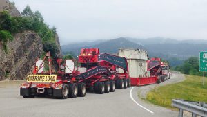 A 19 axle loaded with a transformer moves through the mountains of West Virginia.